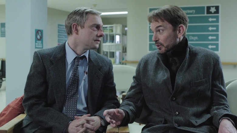 Martin Freeman and Billy Bob Thornton as Lester Nygaard and Lorne Malvo, sitting together in a hospital in Fargo.
