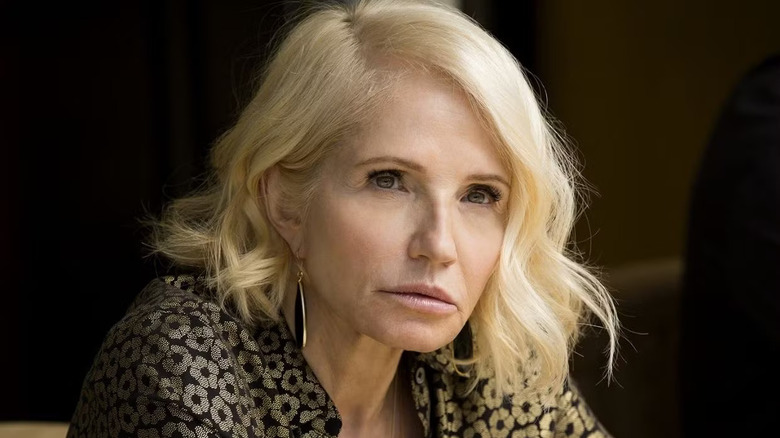Ellen Barkin as Janine "Smurf" Cody, leering at someone in Animal Kingdom.