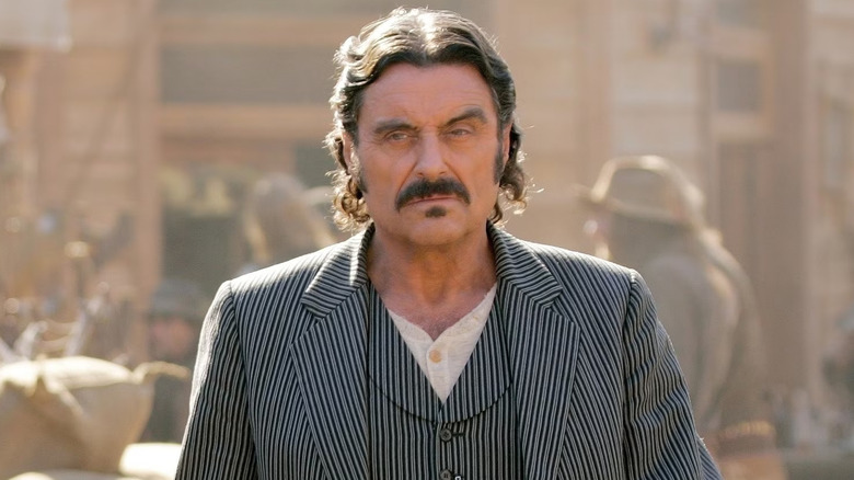 Ian McShaen as Al Swearengen, scowling in Deadwood.