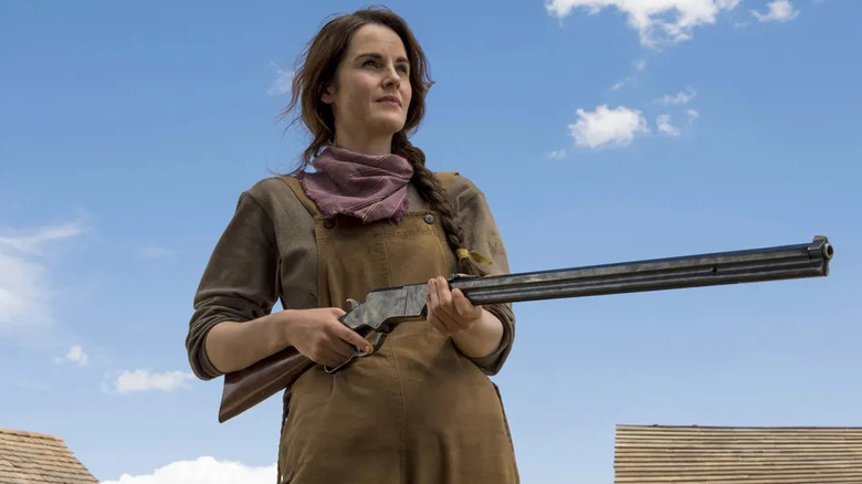 Michelle Dockery as Alice Fletcher, holding a rifle in Godless.