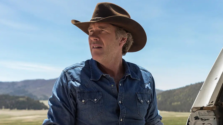 Robert Taylor as Walt Longmire, looking into the distance in Longmire.