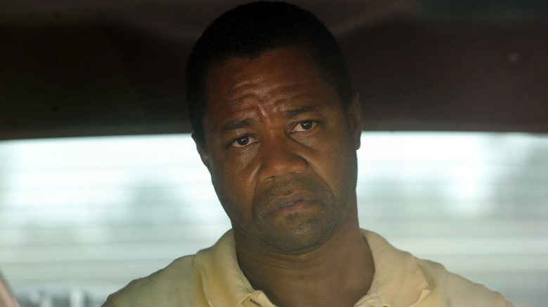 Cuba Gooding Jr. as OJ Simpson in the back of a car in American Crime Story