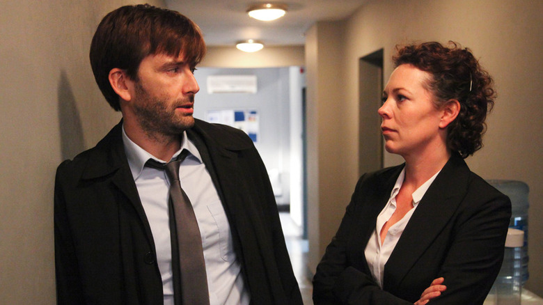 David Tennant and Olivia Colman as Alec Hardy and Ellie Miller looking at one another in Broadchurch