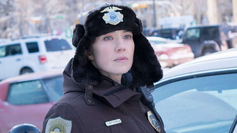 Carrie Coon as Gloria wearing a fur hat outside in Fargo