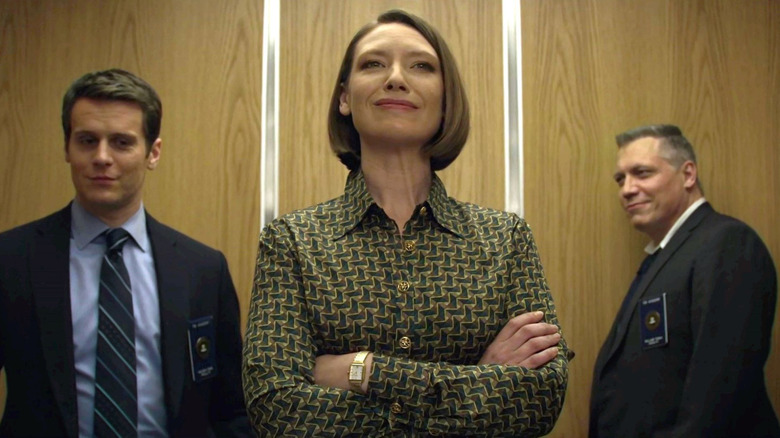 Jonathan Groff, Anna Torv, and Holt McCallany as Holden, Wendy, and Bill in an elevator in Mindhunter
