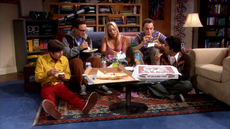 The cast of The Big Bang Theory eating pizza