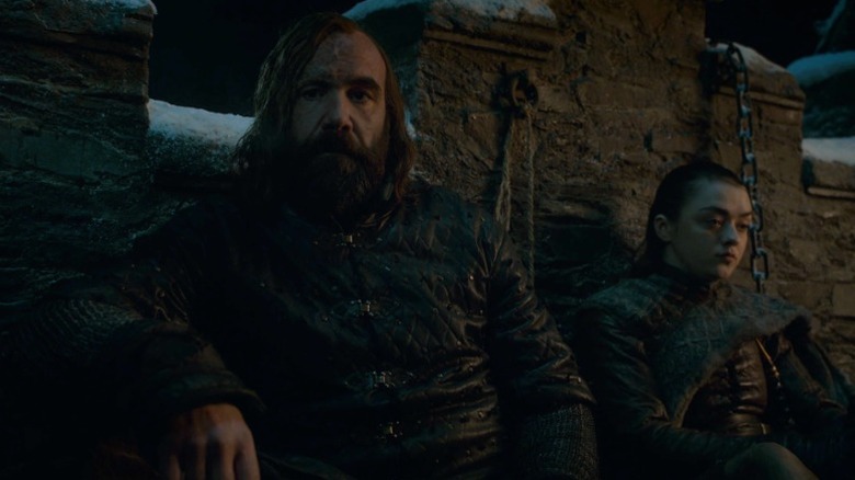 The Hound and Arya sitting side by side on Game of Thrones S8E2