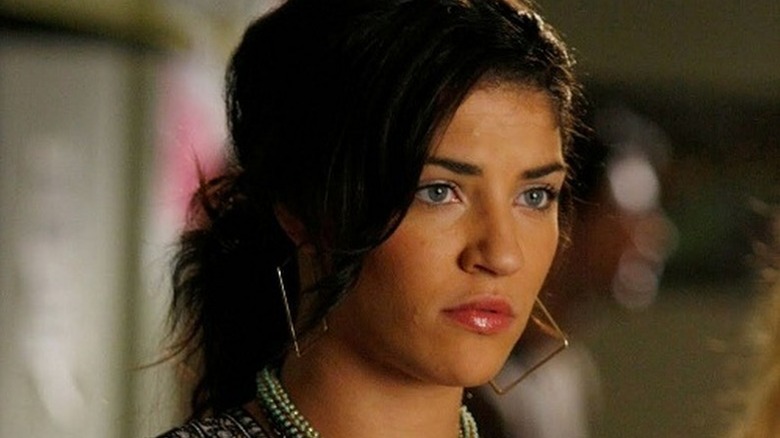 Vanessa Adams (Jessica Szohr) stands pursing her lips in Gossip Girl (2007)
