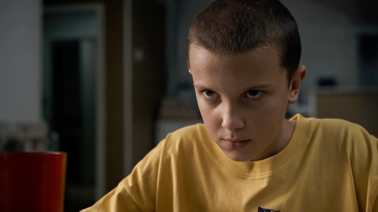Eleven staring intently at something