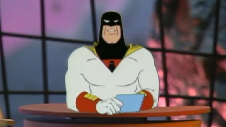 Space Ghost sitting at his desk and addressing the camera on Space Ghost Coast to Coast S2E6