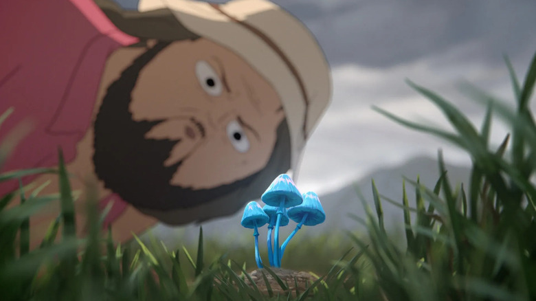Marshall Cuso looking at blue mushrooms on "Common Side Effects."