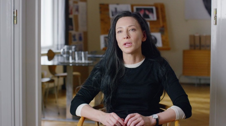 Izabella Barta giving a talking head interview on Documentary Now! S3E4