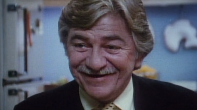 Howard smiling wryly on Tales from the Darkside S3E11