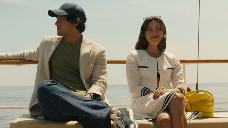 Ethan and Harper sitting on a boat on The White Lotus S2E1