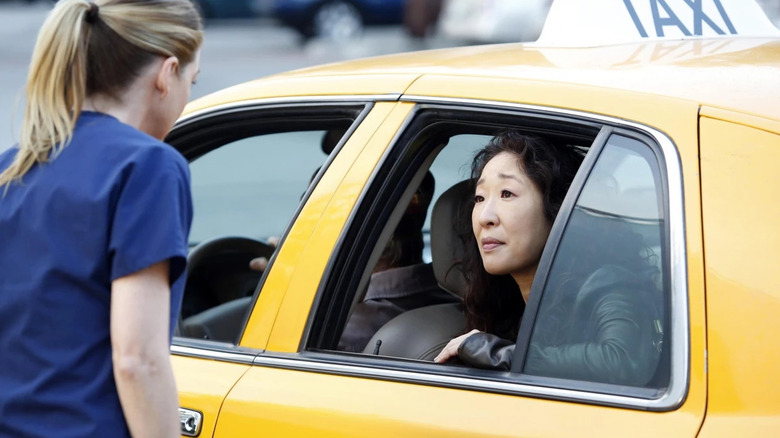 Cristina (Sandra Oh) in a cab talking to Meredith (Ellen Pompeo) on Grey's Anatomy