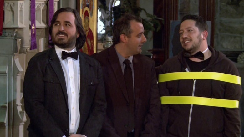 Q, Joe, and a restrained Sal standing in a church on Impractical Jokers S3E31
