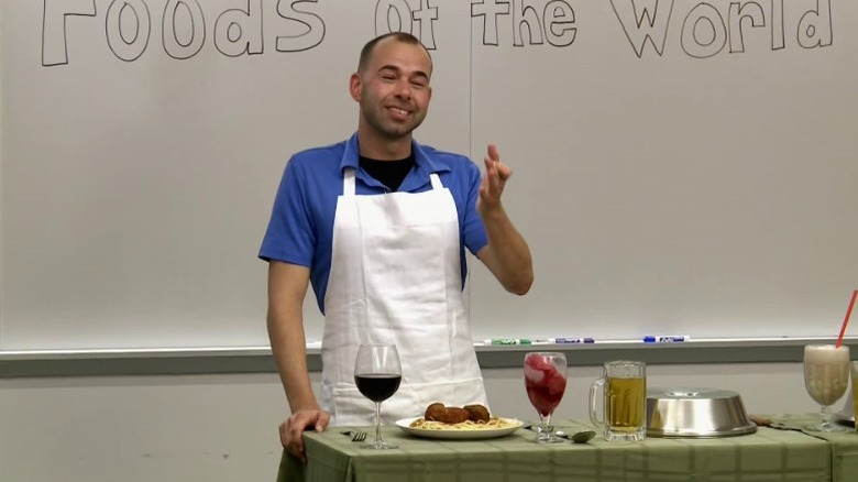 Murr giving a lecture about foods of the world on Impractical Jokers S3E25
