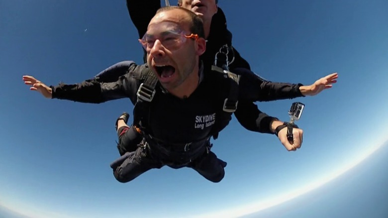 Murr screaming while skydiving with a professional instructor on Impractical Jokers S3E1