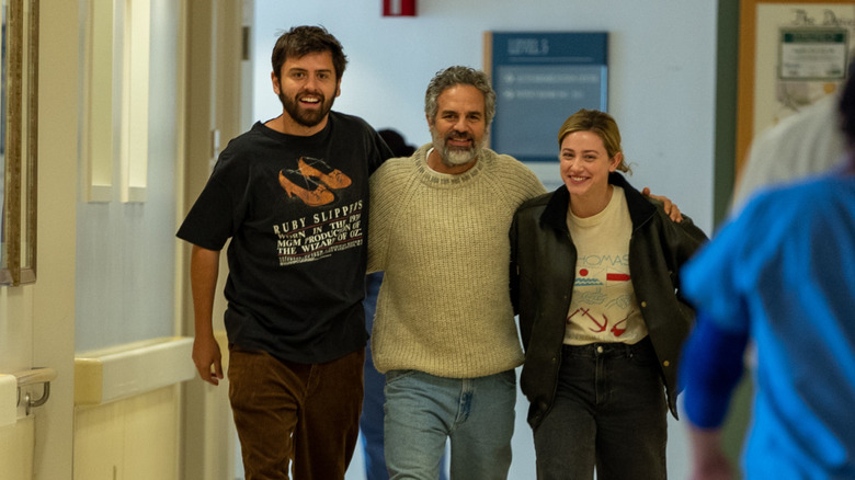 Cooper Raiff, Mark Ruffalo and Lili Reinhart hugging and walking in Hal & Harper