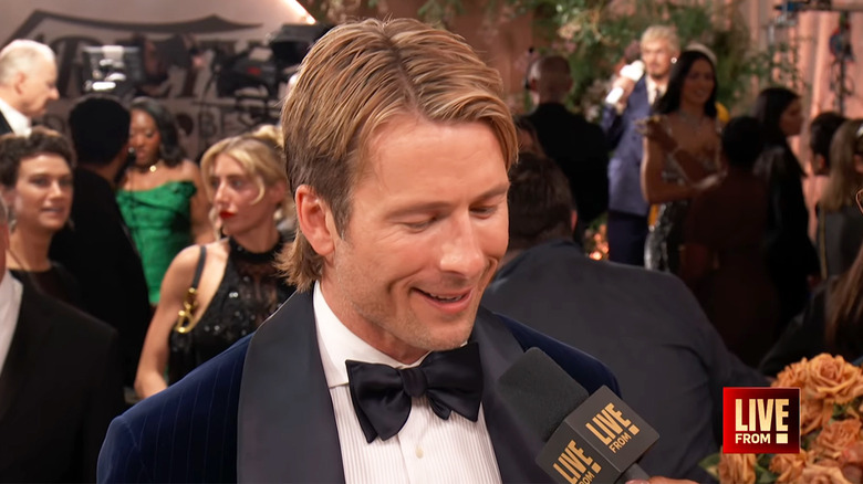 Glen Powell on the 2026 Golden Globes red carpet