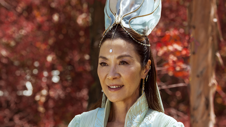 Michelle Yeoh looks to the side in a publicity still for American Born Chinese Season 1