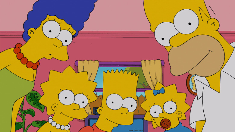 Marge, Lisa, Bart, Maggie, and Homer staring at the screen in The Simpsons