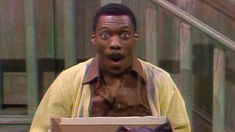 Eddie Murphy as Mr. Robinson looking surprised at the camera on SNL