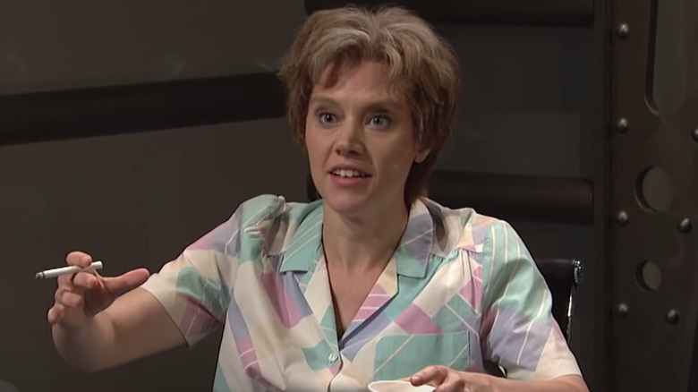 Kate McKinnon as Ms. Rafferty with a cigarette on SNL