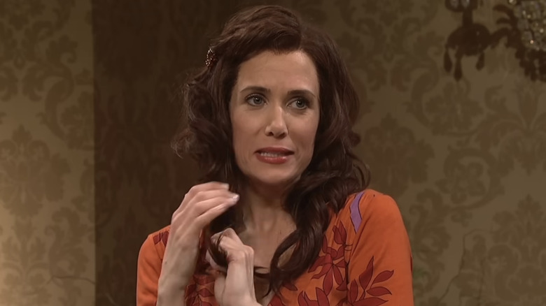 Kristen Wiig as Penelope playing with her hair on SNL