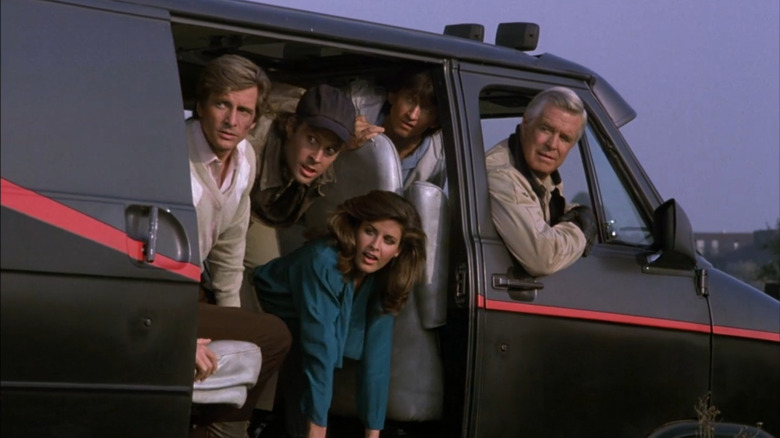 The A-Team look out from the GMC Vandura Van in The A-Team (1983)