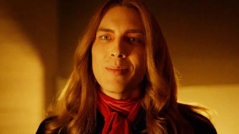 Michael Langdon smiling in "American Horror Story: Apocalypse"