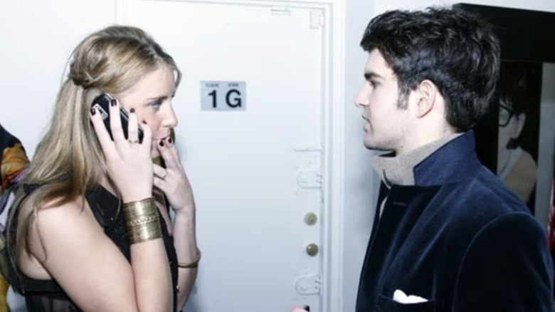 Jessie is on the phone while PC looks on during an episode of NYC Prep