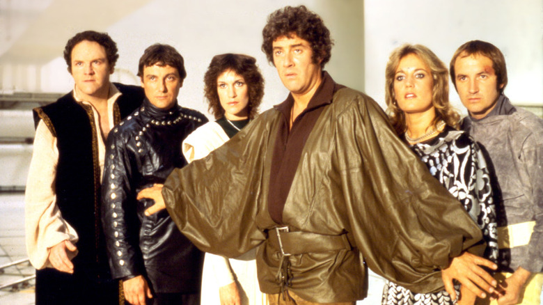 Roj Blake stands before his crew of outlaws on the BBC sci-fi series, Blake's 7.