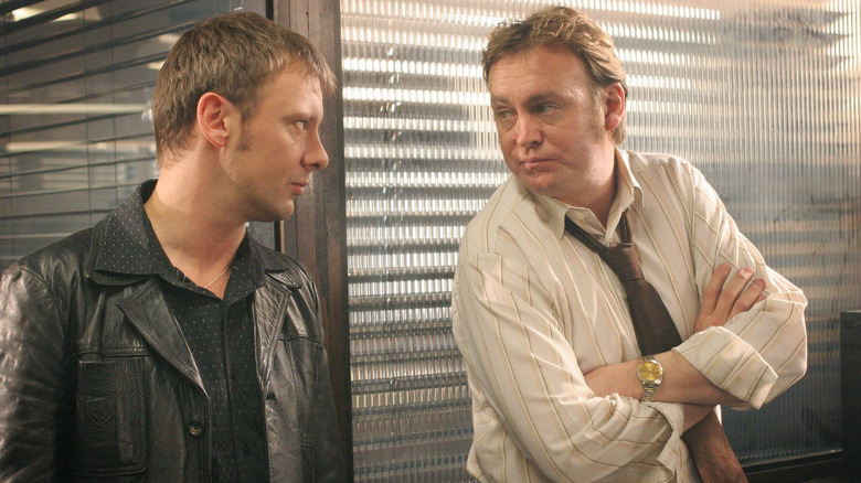 DI Sam Tyler confronts DCI Gene Hunt in the police station on the time-traveling police procedural, Life on Mars.