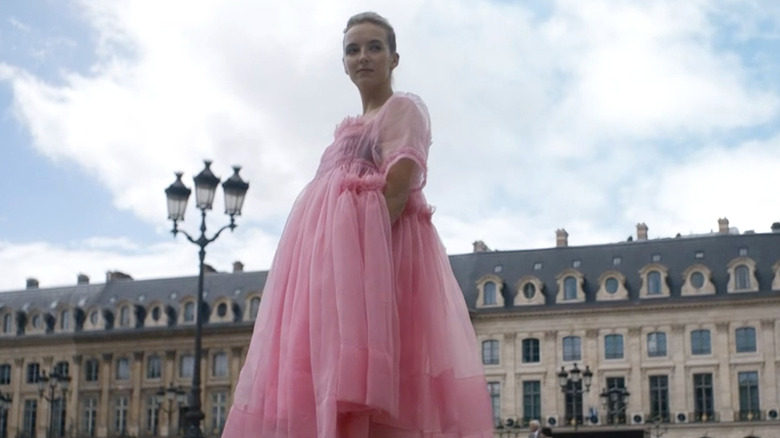 Jodie Comer as Villanelle wearing a pink dress in "Killing Eve."