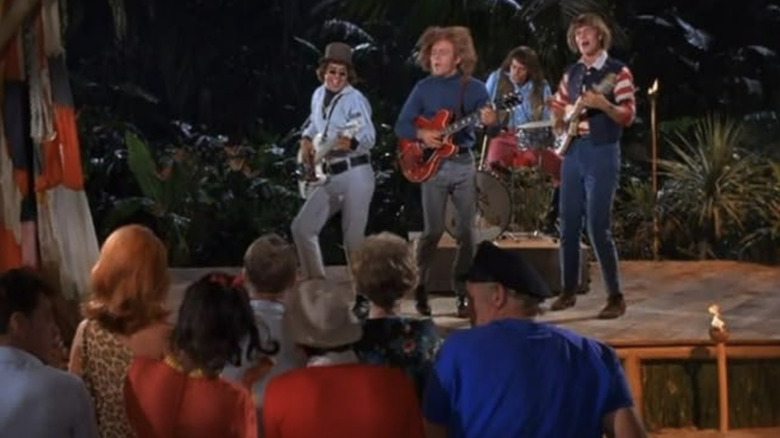 The castaways watching The Mosquitos play in the episode 'Don't Bug the Mosquitoes' on Gilligan's Island