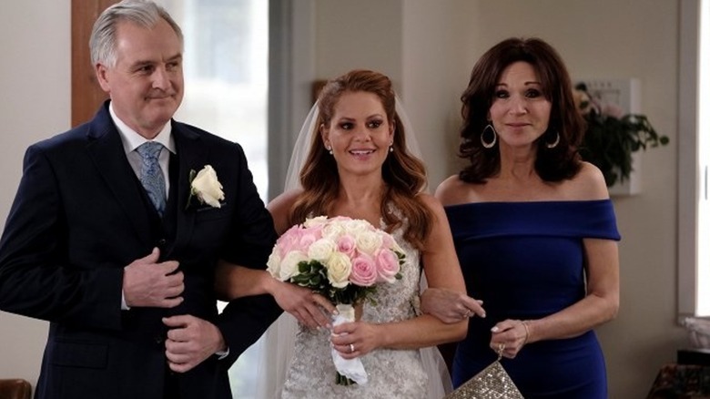 Aurora with her parents on her wedding day in "Til Death Do Us Part"