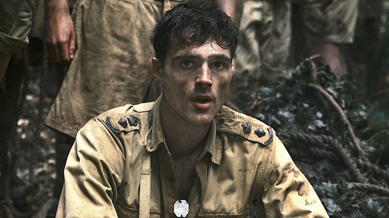 Dorrigo Evans in a tan military shirt in The Narrow Road to the Deep North