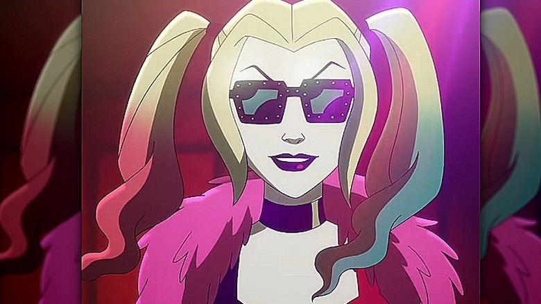 Harley Quinn smiling while wearing sunglasses