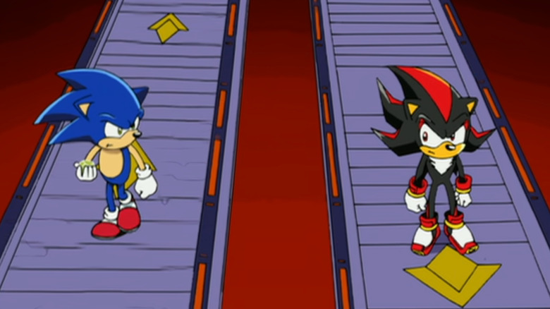A blue anthropomorphic hedgehog with white gloves and red shoes is walking down a bridge holding a yellow diamond. On the right is another bridge with similarly designed hedgehog in black and red, wearing red and white gloves and boots.