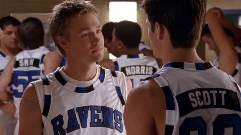 Lucas Scott (Chad Michael Murray) confronting his half-brother Nathan Scott (James Lafferty) in the boys locker room before a basketball game in a scene from "One Tree Hill."