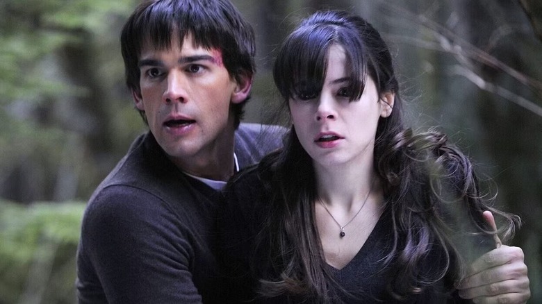 Henry holding Abby in shock