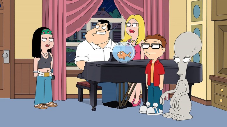 Stan Smith sits at the piano while Francine, Steve, Klaus and Roger all look at an angry Hayley on "American Dad"