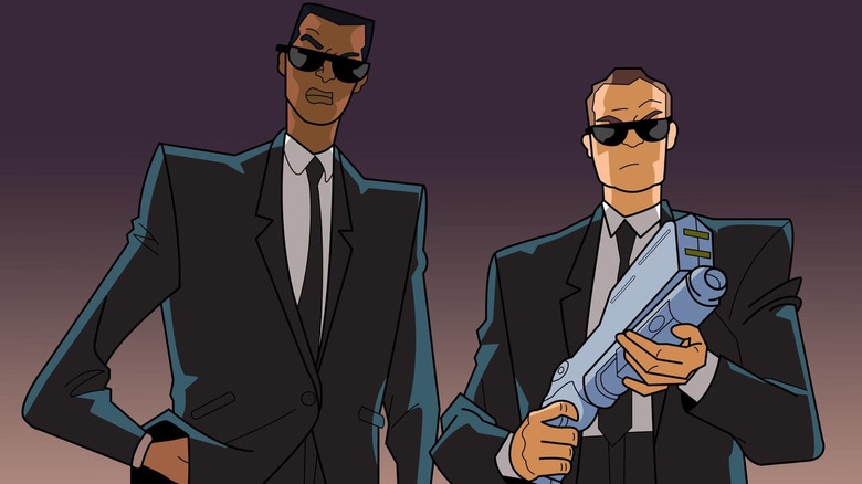 Agents Jay and Kay brandishing weapons in "Men in Black: The Series" (1997)