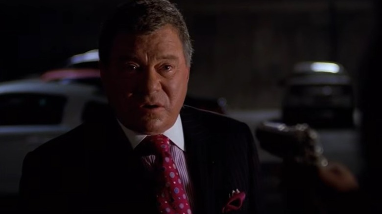 Denny Crane speaking outside