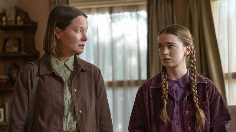 Samantha Sloyan as Margaret and Summer H. Howell as Carrie looking at each other upset in a scene from "Carrie."