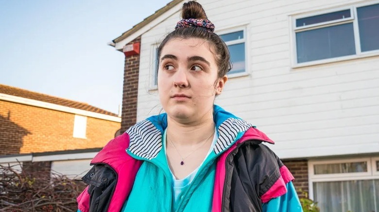 Chi standing outside her house in "Things You Should Have Done"