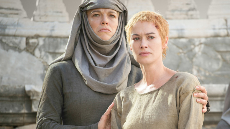 Septa Unella holds Cersei Lannister in "Game of Thrones" (2011)