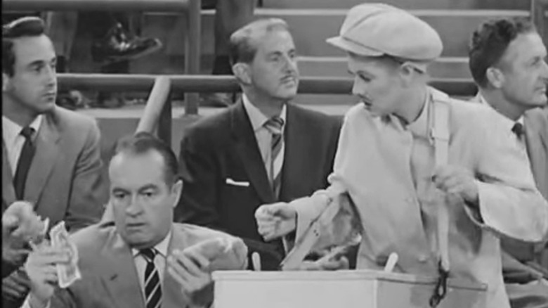 Bob Hope looking flustered while he helps Lucille Ball sell hot dogs on "I Love Lucy."