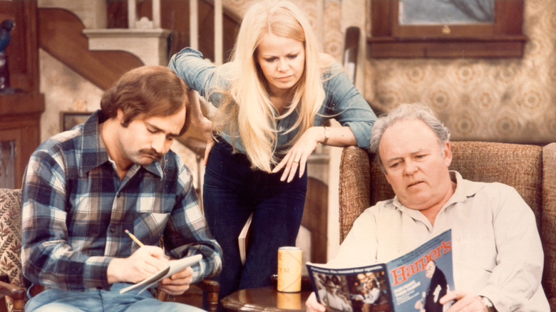 The cast of "All in the Family" together in the living room.